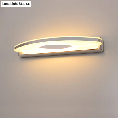 Aplique de pared LED curvo DecorBites™ con acabado en acero inoxidable para baños