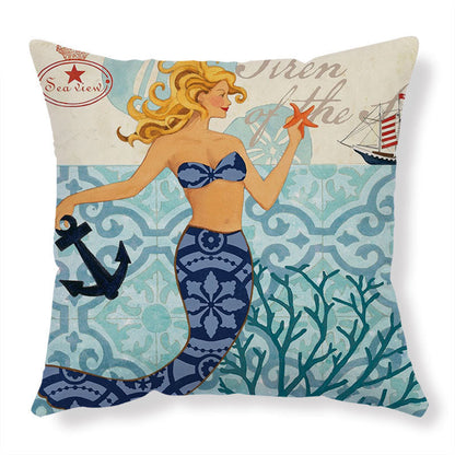 Mermaid-themed throw pillow with navy and white patterned fabric, holding an anchor and starfish.