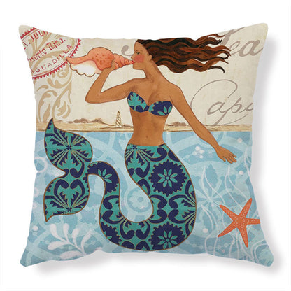 Mermaid pillow with blue and teal tail, brown hair, white bikini top, starfish design on bottom right corner.