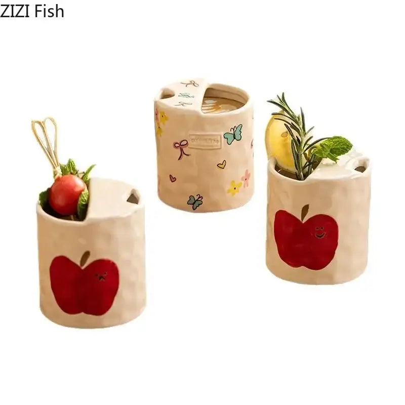 Cute beige ceramic cocktail shakers with red apple decals and decorbites bowknot pattern for charming coffee mug decor