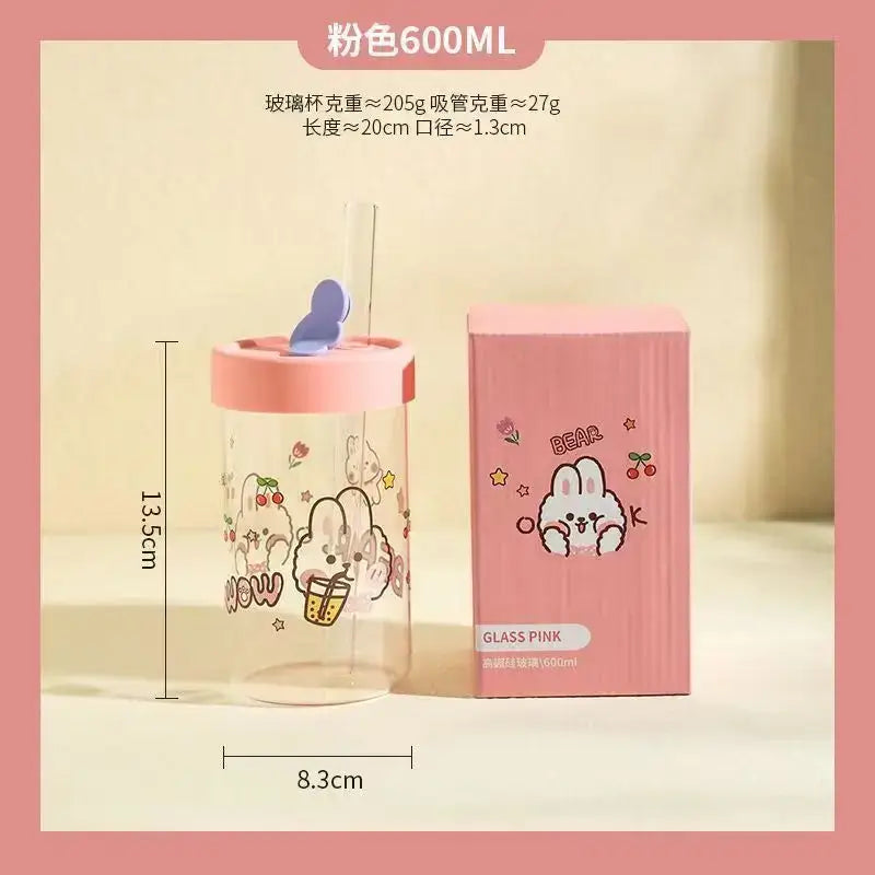 Pink 600ml glass cup with cartoon bunny design and matching pink lid with blue butterfly straw holder decorbites cartoon glass