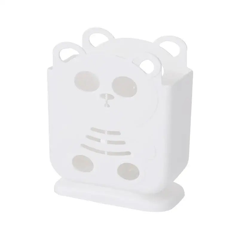 White plastic bear-shaped cutlery organizer stand with cut-out face and rounded ears for kitchen storage decorbites cutlery organizer