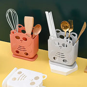 Cute coral and white plastic bear-shaped kitchen storage cutlery organizer stand with cut-out facial features decorbites cutlery organizer