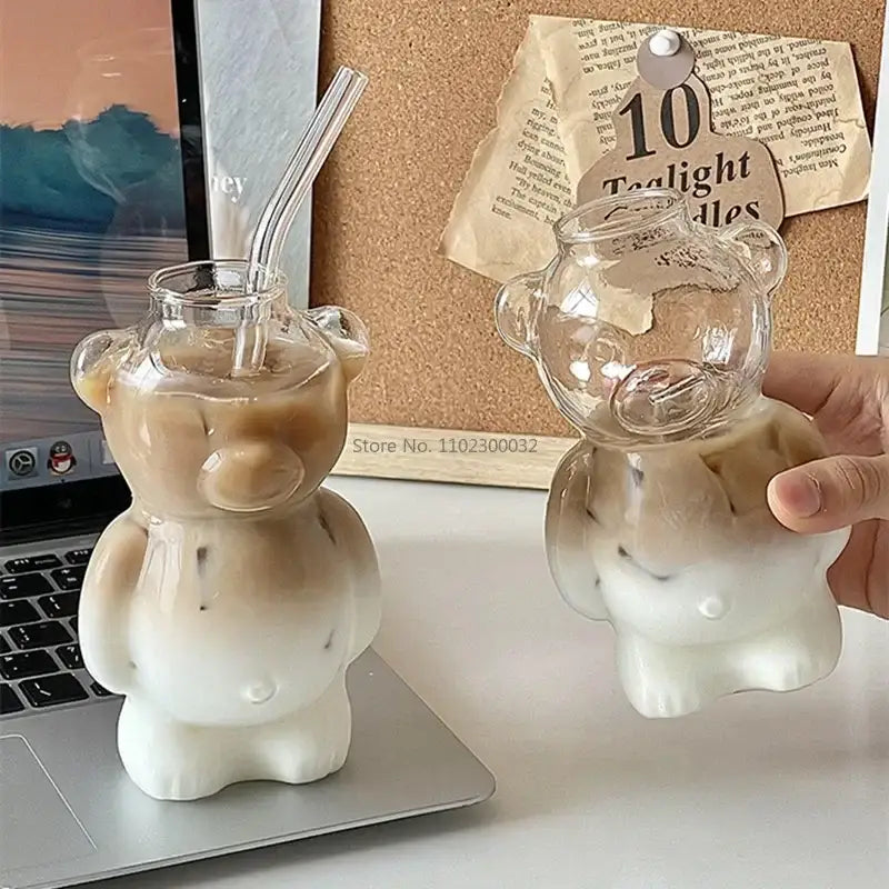 Clear bear glass cups with ceramic base featuring white to transparent gradient and molded ears eyes and paws design
