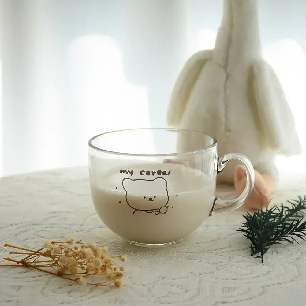 Clear glass mug with handle featuring black bear print and my cereal text for coffee cereal use