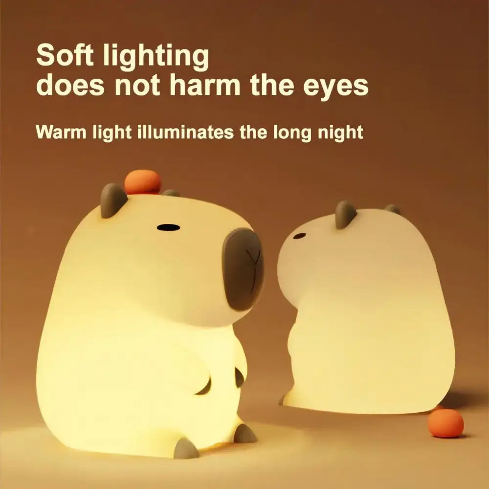 Cute beige plush capybara night light with warm yellow glow and matte silicone finish perfect for kids room decorbites capybara night