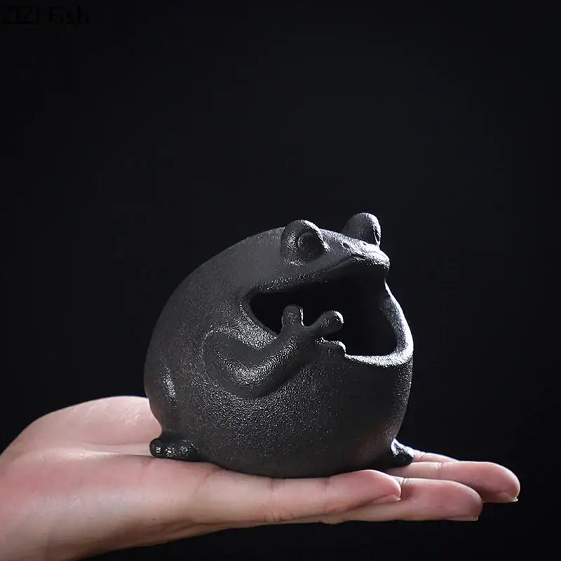Black ceramic big belly frog ashtray with textured surface and open mouth design for living room decor gift