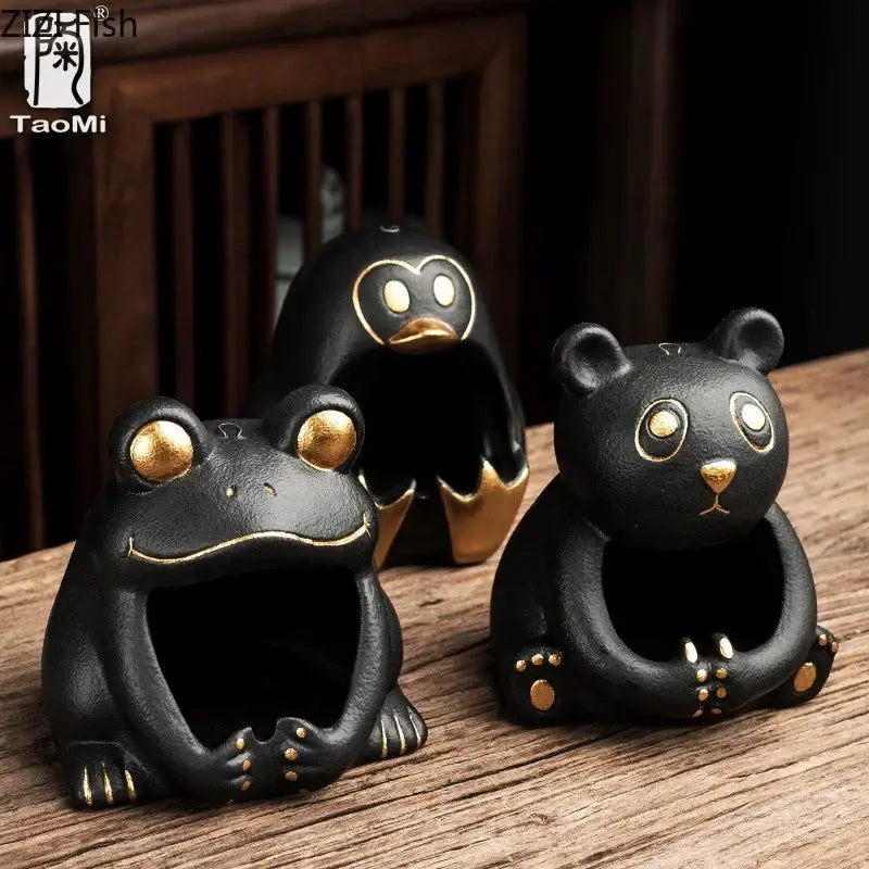 Black ceramic cute cartoon animal ashtray with gold accents featuring frog panda and penguin for living room decor
