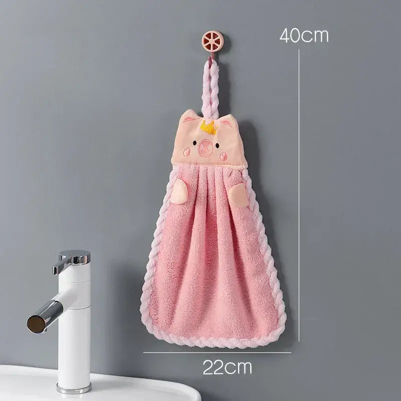 Pink plush pig-shaped hand towel with embroidered face and braided rope handle for decorbites cartoon animal hand set