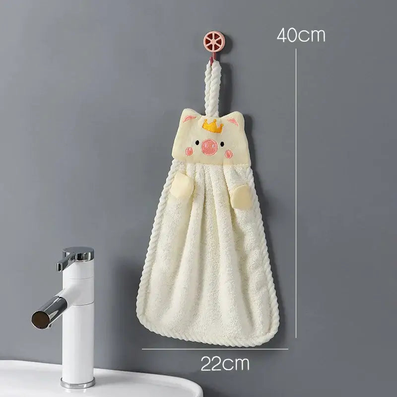 Cute cream-colored plush pig-shaped hand towel with embroidered crown and rosy cheeks for decorbites cartoon animal decor