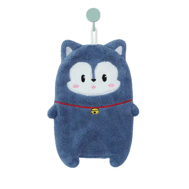 Blue thickened plush cartoon animal hand towel shaped like a cat with white face pink cheeks and red bell trim