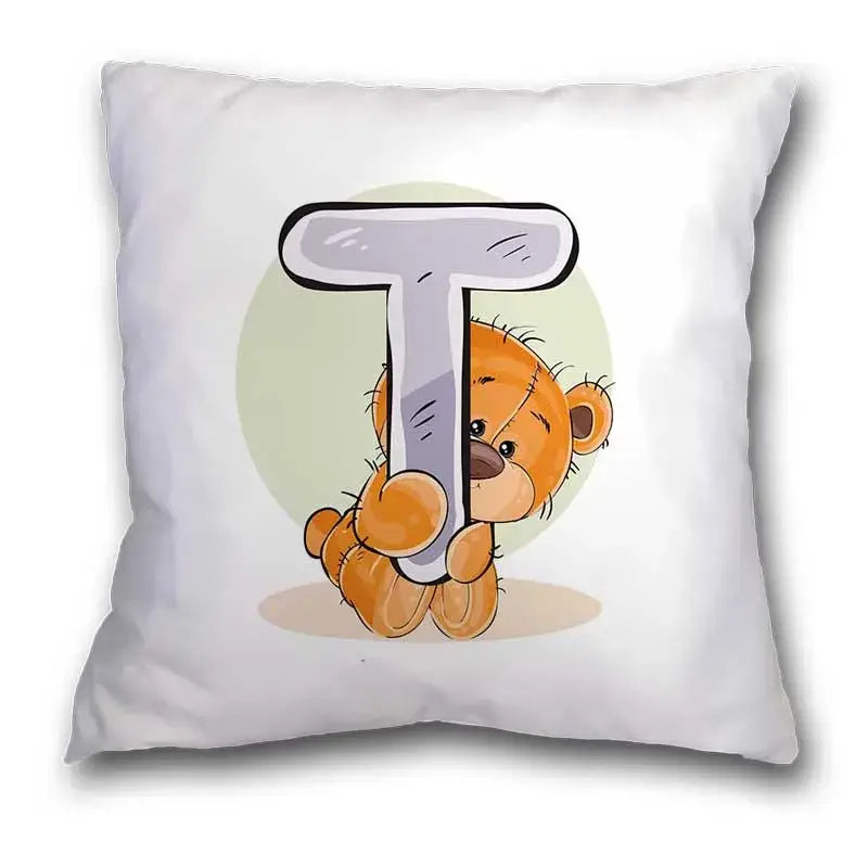 White pillow case with a cute cartoon bear animal holding a silver letter t for bedroom decor