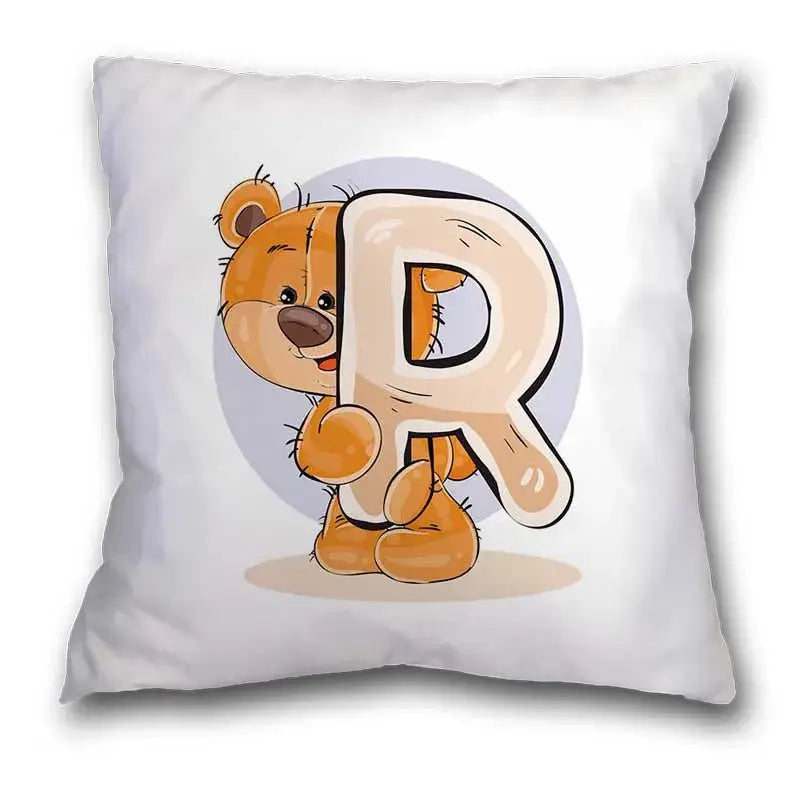 White pillow case with a cute cartoon bear animal holding letter r in beige and black outlines for bedroom decor