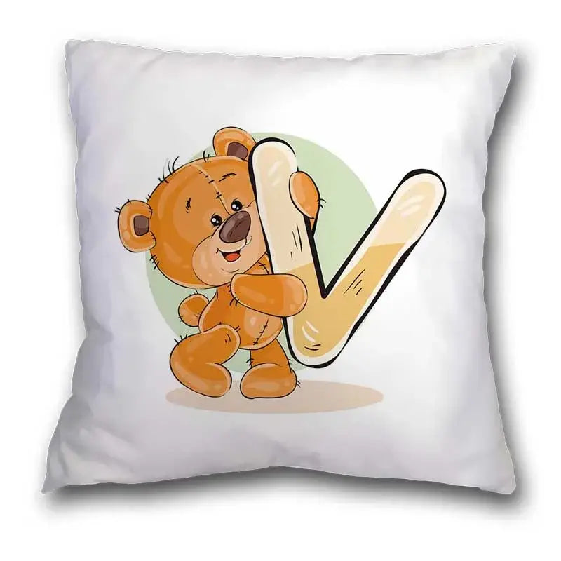 White pillow case featuring a cute cartoon bear animal holding a large letter v for bedroom decor