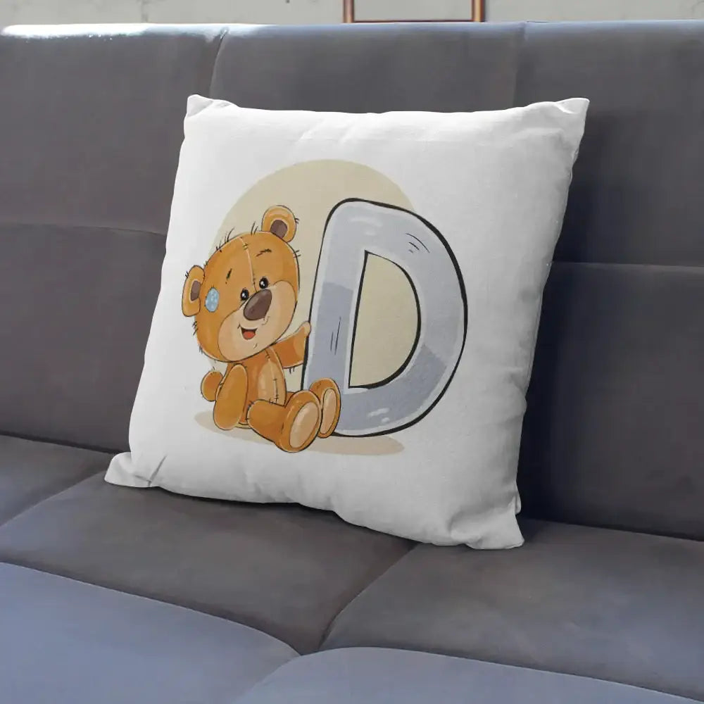 White pillow case featuring a cute cartoon bear animal holding a silver letter d for bedroom decor