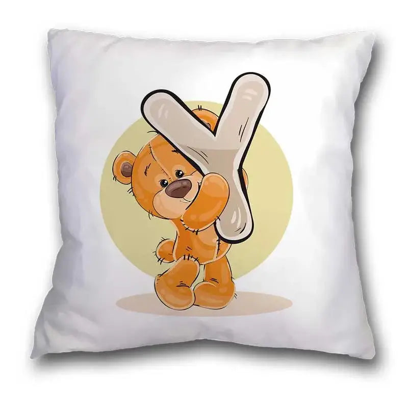 White throw pillow case with cute cartoon bear holding beige letter y for bedroom decor featuring cartoon bear animal