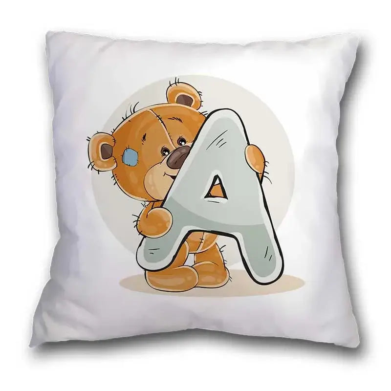 White pillow case featuring a cute cartoon bear animal holding a light gray letter a for bedroom decor