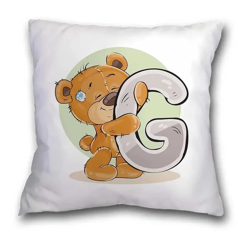 White throw pillow case featuring a cute cartoon bear animal holding a large gray letter g for bedroom decor