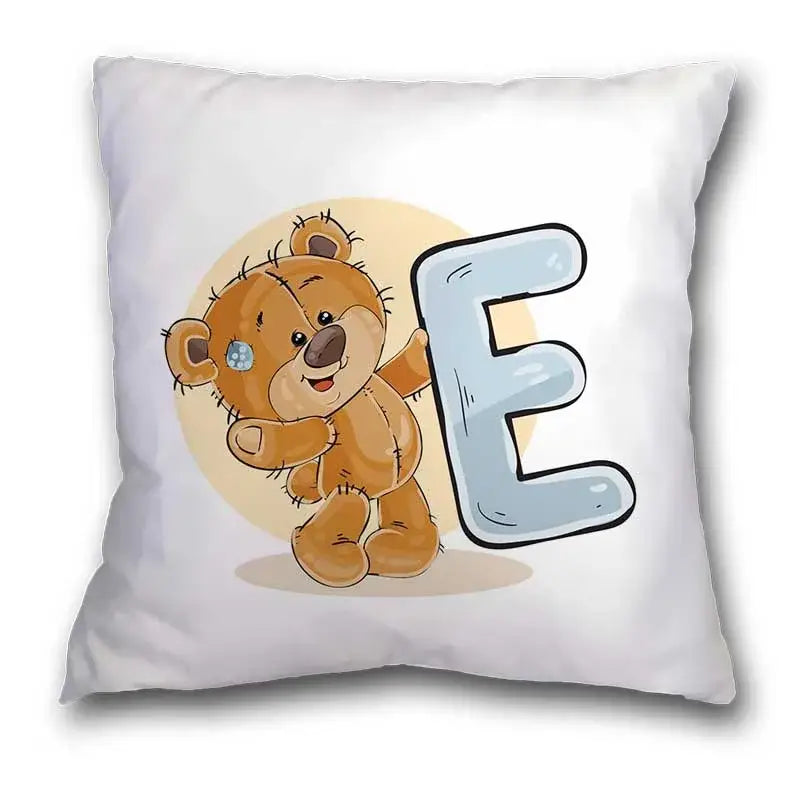 White pillow case featuring a cute cartoon bear animal holding a light blue letter e for bedroom decor