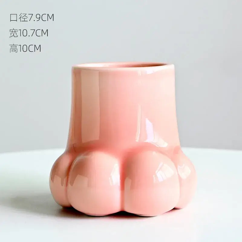 Glossy pink ceramic planter shaped like a cute cartoon cat paw for living room decor vase set