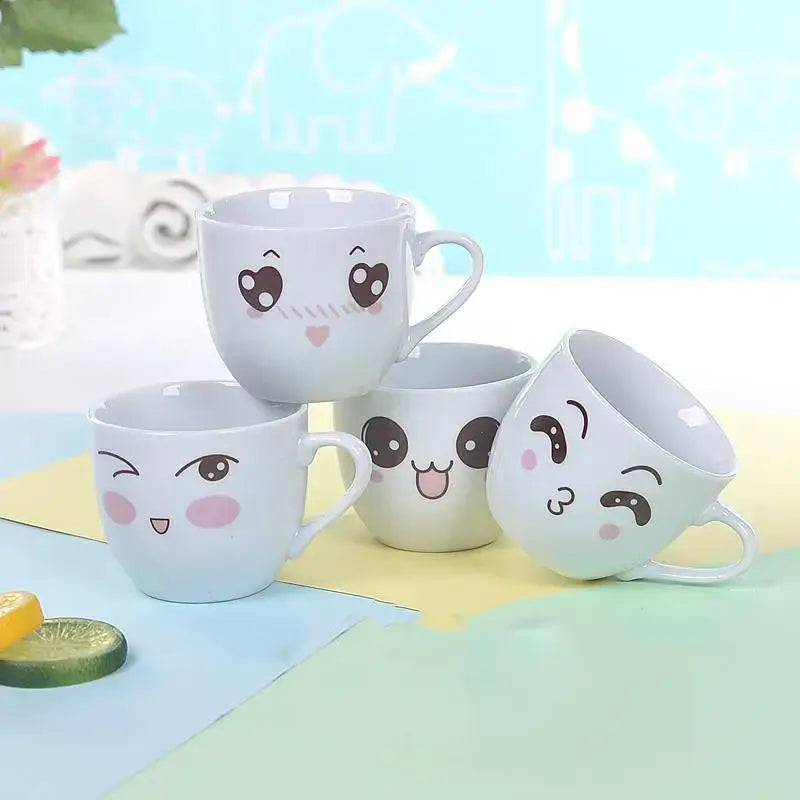 Set of four white ceramic cartoon coffee mugs with expressive faces blush cheeks decorbites cartoon coffee mug set