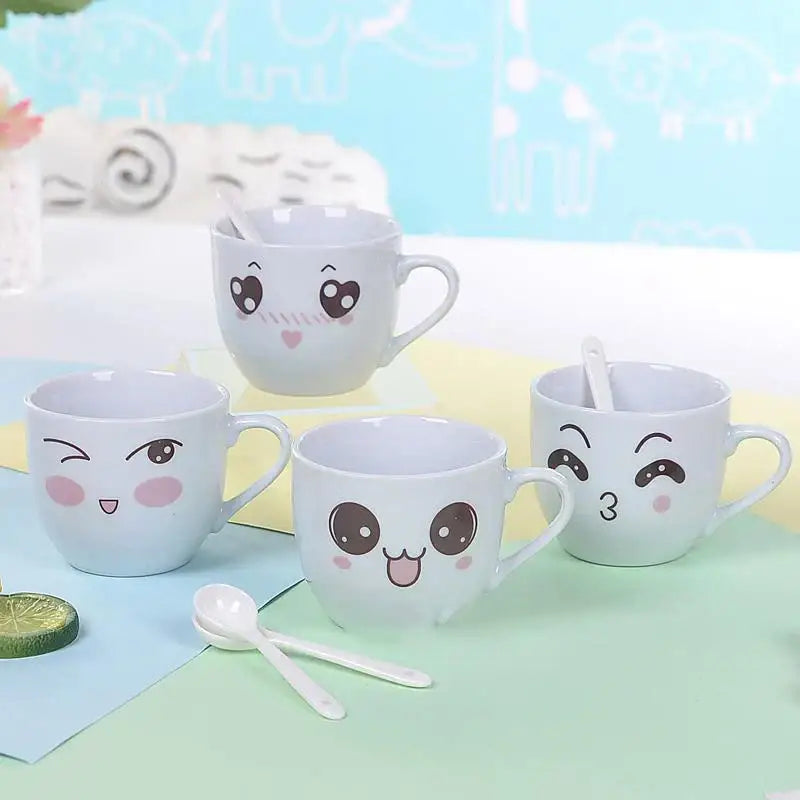 Set of four white ceramic cartoon coffee mugs with cute faces and matching spoons for kitchen couple gift decorbites cartoon coffee