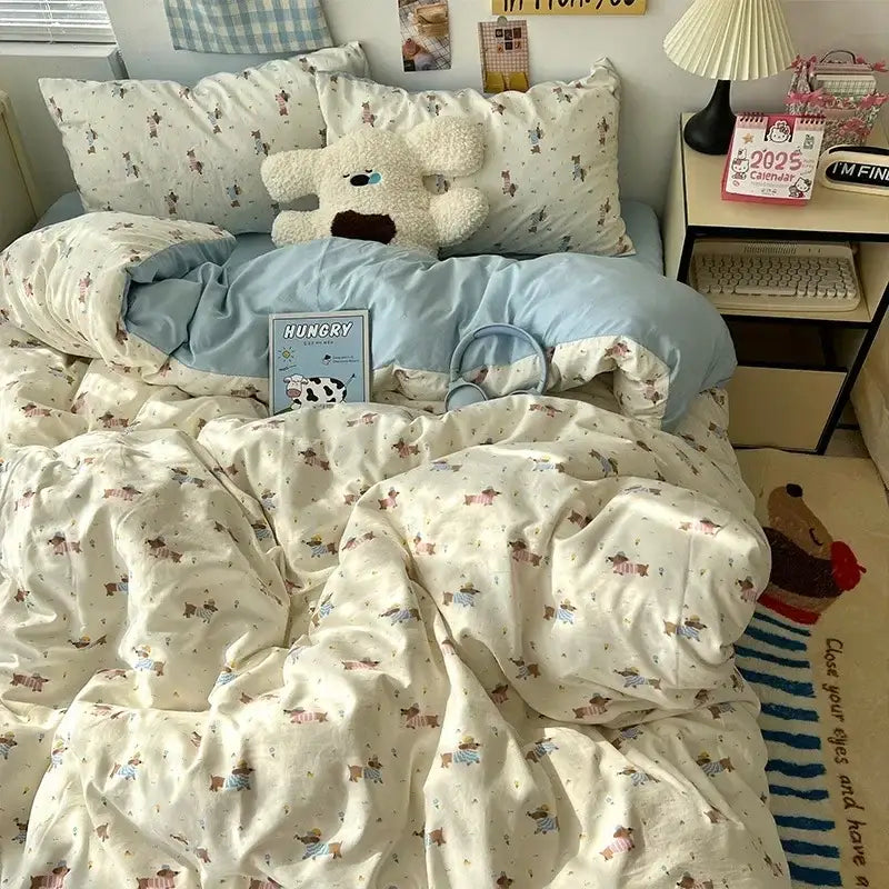 Cream-colored cute cartoon washed cotton bedding set featuring playful small dogs in various outfits and poses