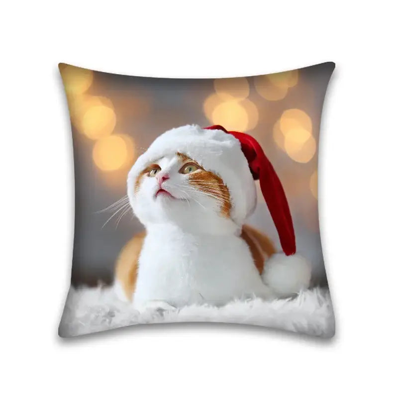 Square pillow case featuring a cute cat anime design of a white and orange cat wearing a red santa hat