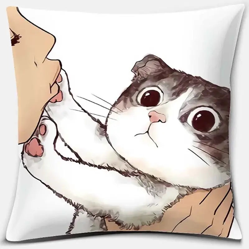 White throw pillow with cute cat kiss cartoon featuring a fluffy gray and white cat held by a hand for bedroom decor