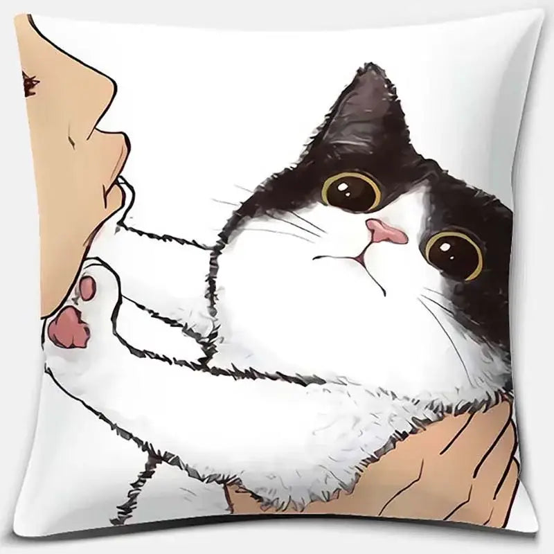 White throw pillow featuring a cute cat kiss cartoon of a black and white cat with large yellow eyes held gently for bedroom decor