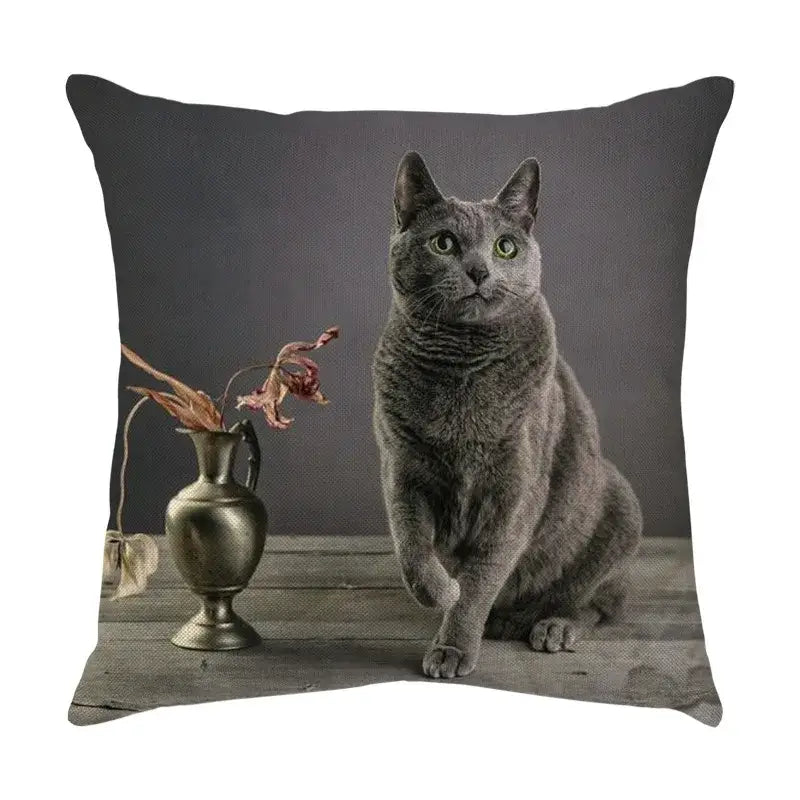Gray russian blue cat sofa cotton linen cushion cover with printed feline beside antique vase on wooden surface