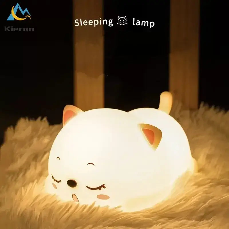 Cute cream cat silicone led night light shaped like a white cartoon cat with orange ears emitting warm light decorbites cat silicone