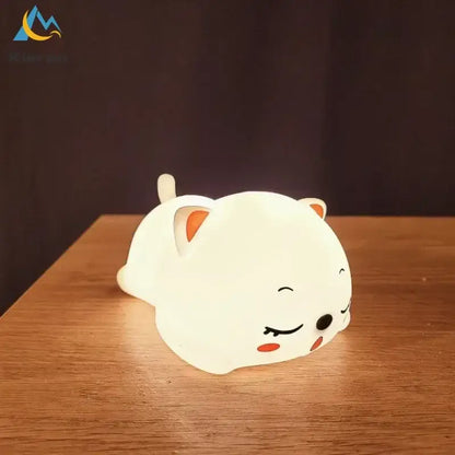 Cute cream cat silicone led night light with white body orange inner ears and rosy cheeks for bedroom decorbites decor