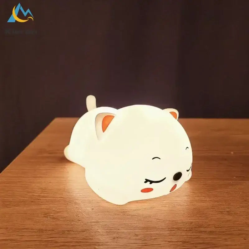 Cute cream cat silicone led night light with orange ears and rosy cheeks for bedroom decorbites cat silicone night light
