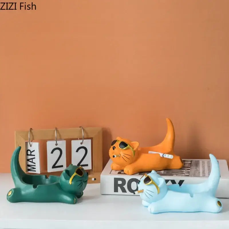 Orange resin glasses cat ashtray shaped like a cute cat with sunglasses and cigarette resting on its back for living room decor