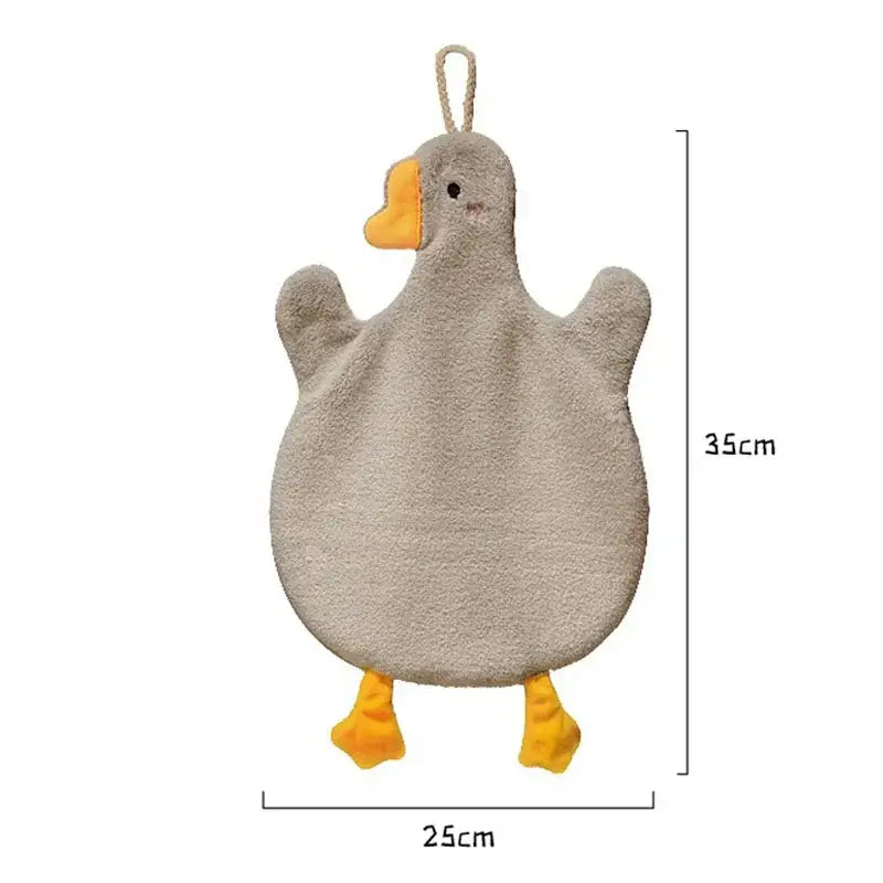 A soft plush gray duck-shaped bath sponge with yellow beak and feet complements decorbites cute goose microfiber hand towels