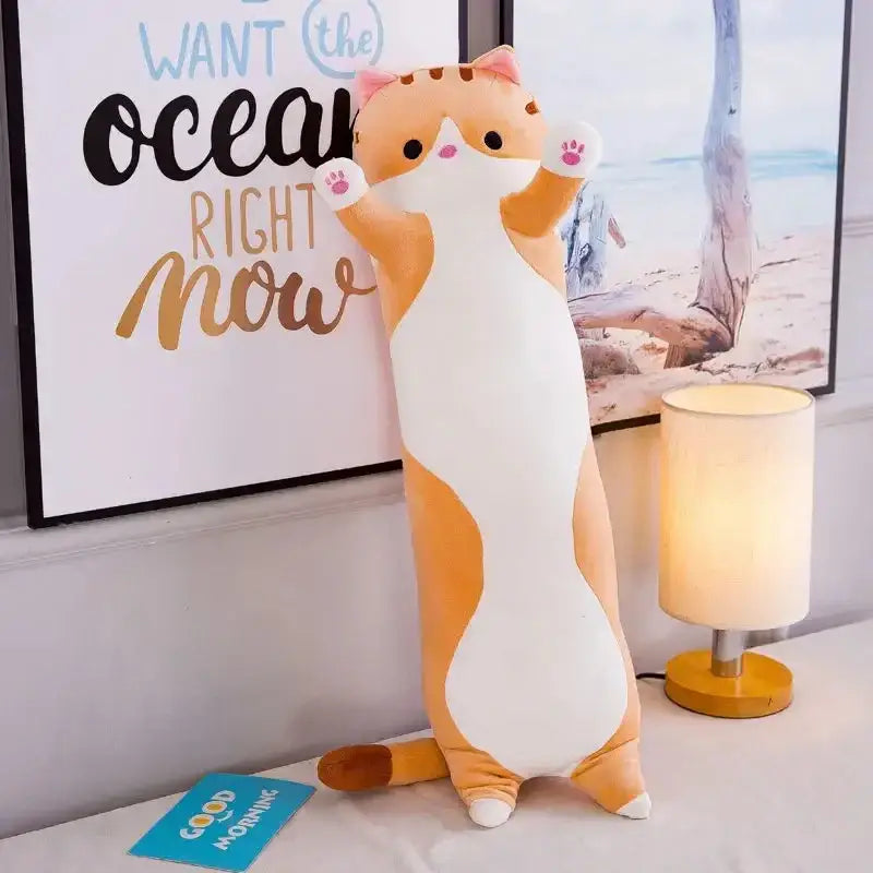 A plush orange and white long cat-shaped body pillow with pink paw pads paired with decorbites husky dog body pillow