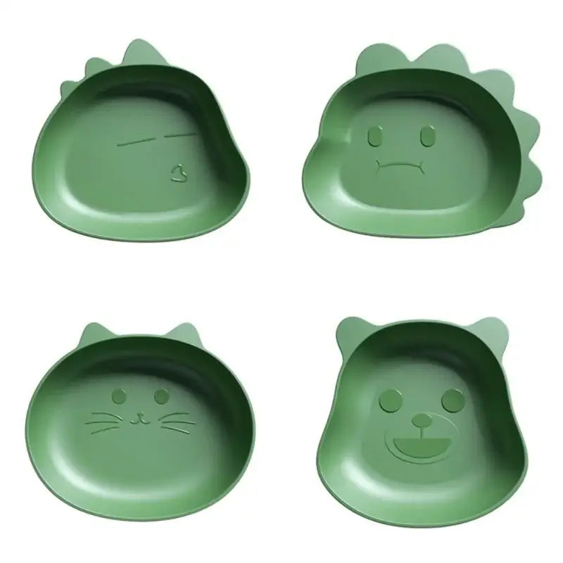 Set of four green plastic bear shape fruit plates with cute facial expressions and spiky ears for snacks