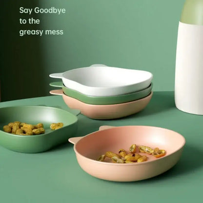 Pastel pink and sage green cat-ear dishware bowls with smooth matte finish complement bear shape fruit plate set of 4