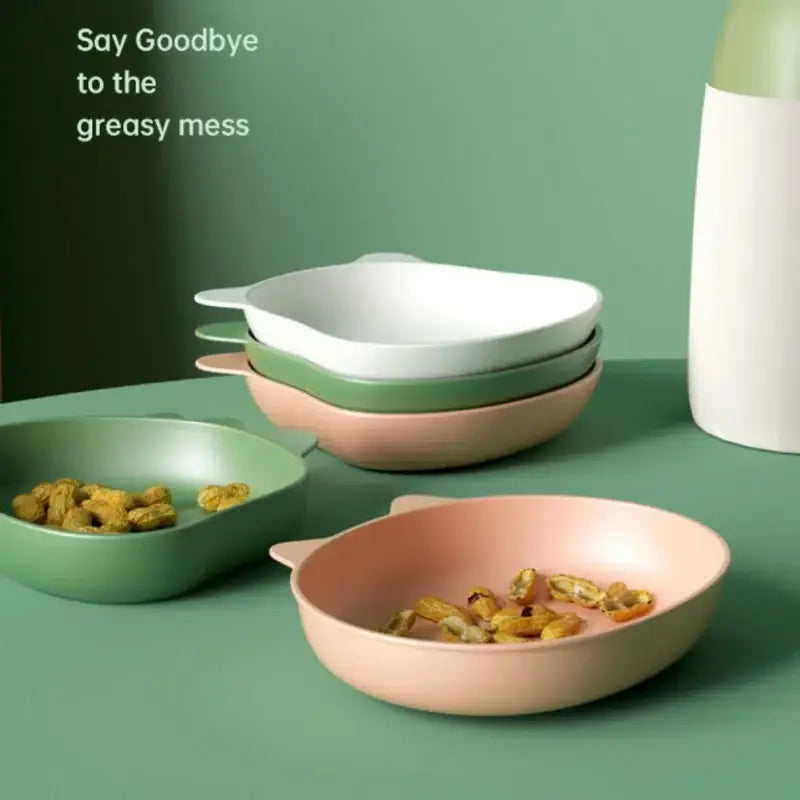 Pastel pink and sage green cat-ear dishware bowls with smooth matte finish complement bear shape fruit plate set of 4