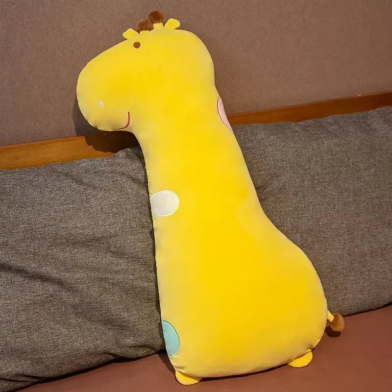 A plush yellow giraffe sleep body pillow with velvety texture and colorful spots by decorbites cartoon animal for bedroom decor
