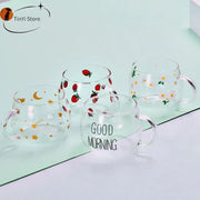 Clear glass mug with colorful strawberry daisy star and moon prints from decorbites cute letter glass collection