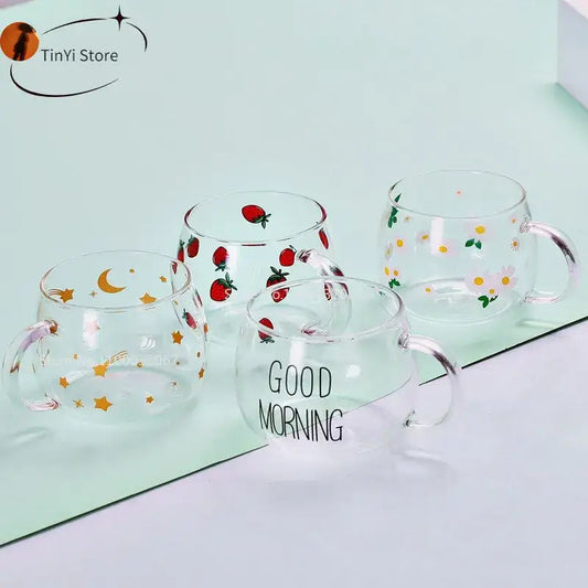 Clear glass mug with colorful strawberry daisy star and moon prints from decorbites cute letter glass collection