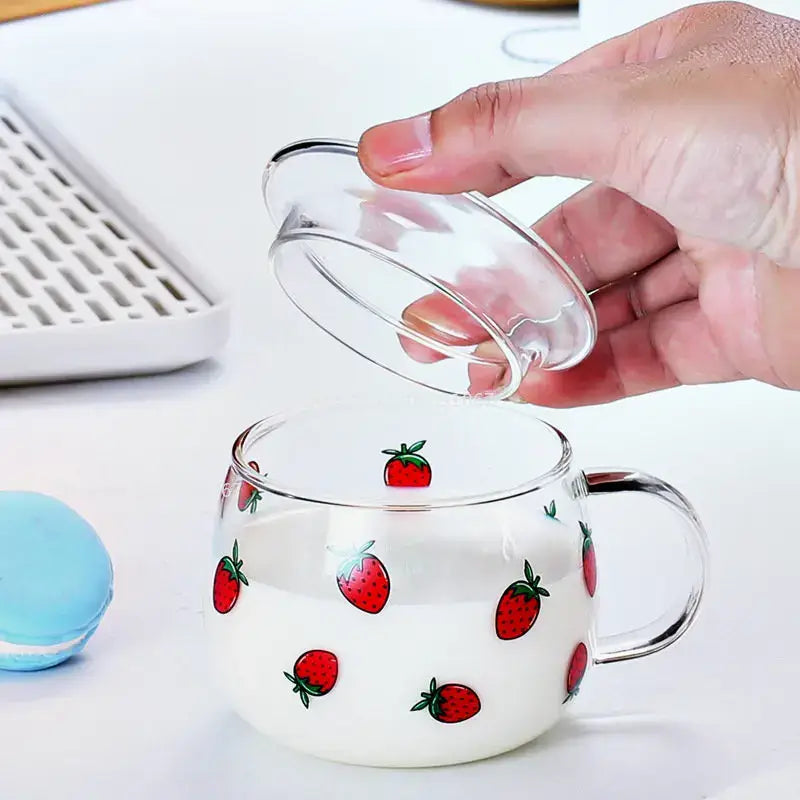 Clear glass mug with red strawberry decals and matching transparent lid from decorbites cute letter glass collection