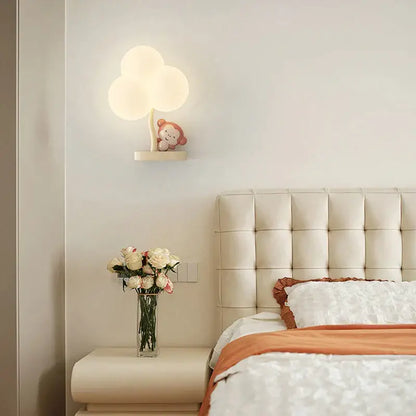 Cute monkey tree wall lamp with cloud shape light and plush monkey figurine by decorbites for bedroom decor
