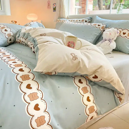 Cute pastel bear cotton bedding set with floral print featuring pastel blue and cream heart and bow patterns
