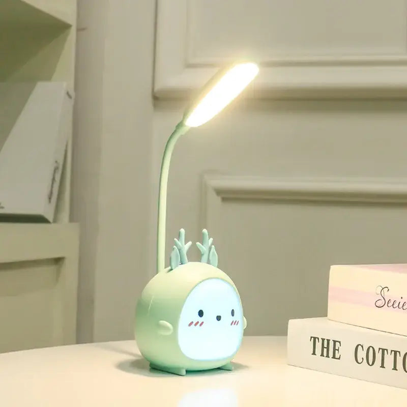 Pastel green deer-shaped decorbites cartoon led desk lamp with flexible neck and cute face for bedroom night light decor