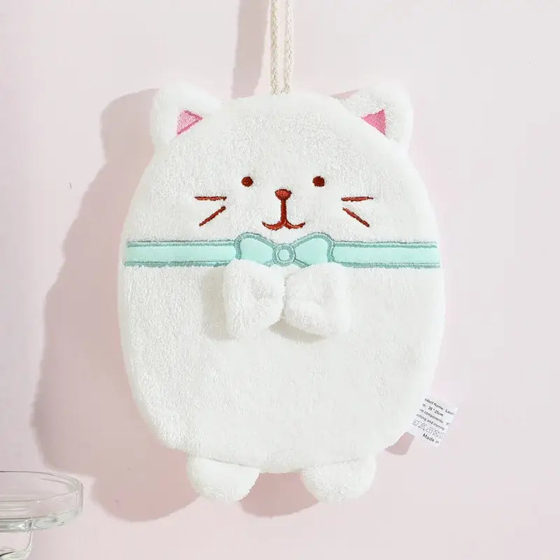 White plush cat hand towel with pink inner ears embroidered face and light blue bow tie cute cat hand towel