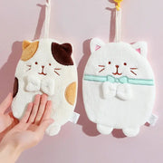 Cute patchwork and white cat hand towel plush sponges featuring brown beige and solid white colors with ribbons
