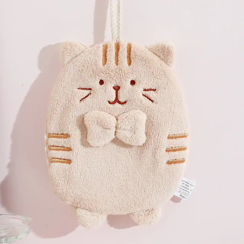 Cream-colored plush cat hand towel with embroidered brown stripes and bow tie soft bathroom cat hand sponge